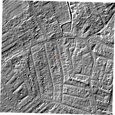 Shaded relief map of the ground around PE13PR, computed from Environment Agency LiDAR. The ground here sits at about 12 m above sea level and falls 5 m across the surrounding 800 m. Surface water reaching this point runs off ground lying to the south-east, 2.8 m higher.