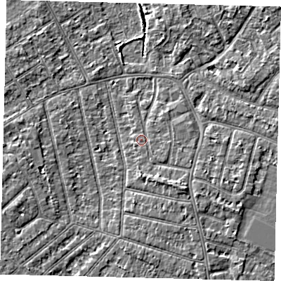 Shaded relief map of the ground around PE13RA, computed from Environment Agency LiDAR. The ground here sits at about 12 m above sea level and falls 5 m across the surrounding 800 m. Surface water reaching this point runs off ground lying to the south-east, 2.1 m higher.