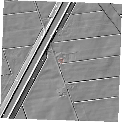 Shaded relief map of the ground around PE148JU, computed from Environment Agency LiDAR. The ground here sits at about -1 m above sea level and falls 6 m across the surrounding 800 m. Surface water reaching this point runs off ground lying to the south, 1.6 m higher.