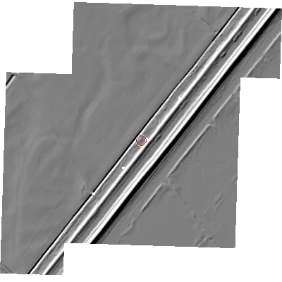 Shaded relief map of the ground around PE149TE, computed from Environment Agency LiDAR. The ground here sits at about 0 m above sea level and falls 9 m across the surrounding 800 m. Surface water reaching this point runs off ground lying to the south, 5.2 m higher.