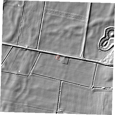 Shaded relief map of the ground around PE150TY, computed from Environment Agency LiDAR. The ground here sits at about -0 m above sea level and falls 6 m across the surrounding 800 m. Surface water reaching this point runs off ground lying to the west-north-west, 2.7 m higher.