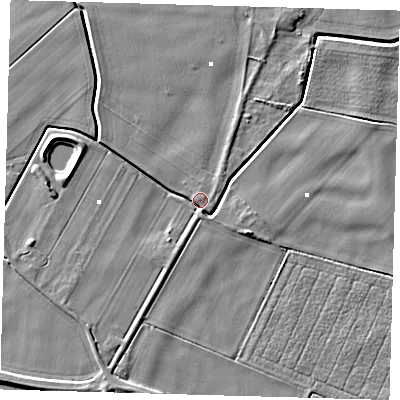 Shaded relief map of the ground around PE150XS, computed from Environment Agency LiDAR. The ground here sits at about 0 m above sea level and falls 5 m across the surrounding 800 m. Surface water reaching this point runs off ground lying to the north-north-east, 3.2 m higher.