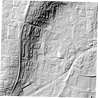 Shaded relief map of the ground around PE197JN, computed from Environment Agency LiDAR. The ground here sits at about 16 m above sea level and falls 17 m across the surrounding 800 m. Surface water reaching this point runs off ground lying to the south-east, 2.2 m higher.