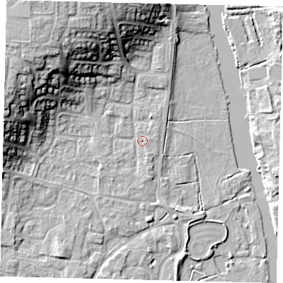 Shaded relief map of the ground around PE197RA, computed from Environment Agency LiDAR. The ground here sits at about 16 m above sea level and falls 18 m across the surrounding 800 m. Surface water reaching this point runs off ground lying to the south-west, 1.3 m higher.