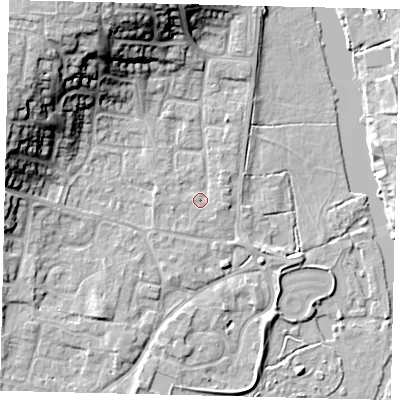 Shaded relief map of the ground around PE197RE, computed from Environment Agency LiDAR. The ground here sits at about 16 m above sea level and falls 17 m across the surrounding 800 m. Surface water reaching this point runs off ground lying to the west, 1.1 m higher.