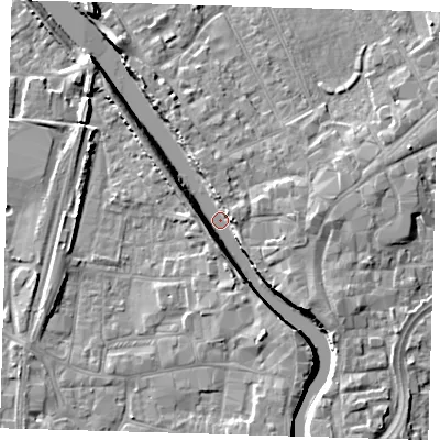 Shaded relief map of the ground around PE216NU, computed from Environment Agency LiDAR. The ground here sits at about 0 m above sea level and falls 7 m across the surrounding 800 m. Surface water reaching this point runs off ground lying to the north-north-west, 6.5 m higher.