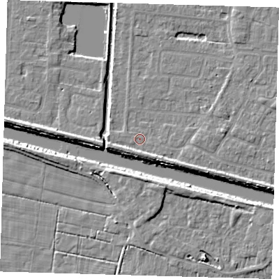 Shaded relief map of the ground around PE218BW, computed from Environment Agency LiDAR. The ground here sits at about 3 m above sea level and falls 6 m across the surrounding 800 m. Surface water reaching this point runs off ground lying to the south-east, 2.4 m higher.