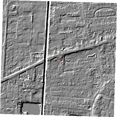 Shaded relief map of the ground around PE218EY, computed from Environment Agency LiDAR. The ground here sits at about 2 m above sea level and falls 4 m across the surrounding 800 m. Surface water reaching this point runs off ground lying to the west, 1.8 m higher.