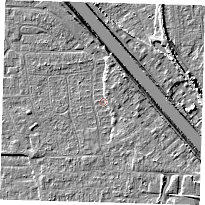 Shaded relief map of the ground around PE218LL, computed from Environment Agency LiDAR. The ground here sits at about 2 m above sea level and falls 7 m across the surrounding 800 m. Surface water reaching this point runs off ground lying to the north-north-east, 1.5 m higher.