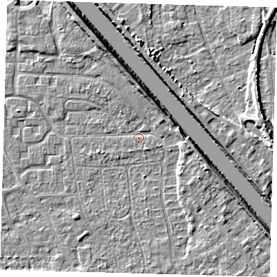 Shaded relief map of the ground around PE218NE, computed from Environment Agency LiDAR. The ground here sits at about 3 m above sea level and falls 6 m across the surrounding 800 m. Surface water reaching this point runs off ground lying to the north-north-west, 4.5 m higher.