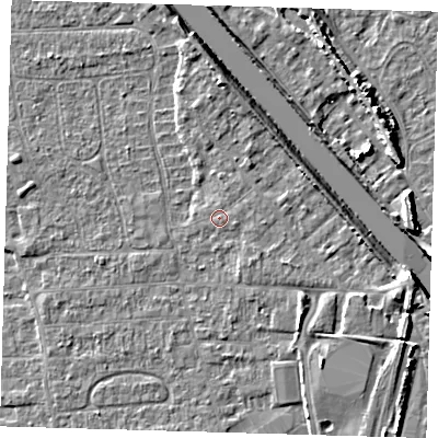 Shaded relief map of the ground around PE218PL, computed from Environment Agency LiDAR. The ground here sits at about 4 m above sea level and falls 8 m across the surrounding 800 m. Surface water reaching this point runs off ground lying to the east-north-east, 0.7 m higher.