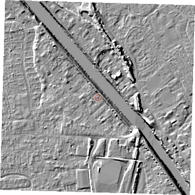 Shaded relief map of the ground around PE218PU, computed from Environment Agency LiDAR. The ground here sits at about 3 m above sea level and falls 8 m across the surrounding 800 m. Surface water reaching this point runs off ground lying to the south-east, 3.8 m higher.