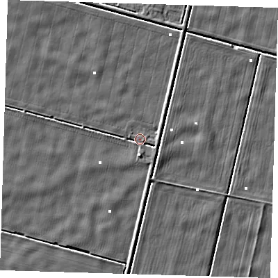 Shaded relief map of the ground around PE228HG, computed from Environment Agency LiDAR. The ground here sits at about -0 m above sea level and falls 3 m across the surrounding 800 m. Surface water reaching this point runs off ground lying to the south-east, 2.4 m higher.