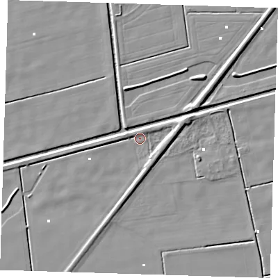 Shaded relief map of the ground around PE228LH, computed from Environment Agency LiDAR. The ground here sits at about -0 m above sea level and falls 5 m across the surrounding 800 m. Surface water reaching this point runs off ground lying to the east-north-east, 3.5 m higher.