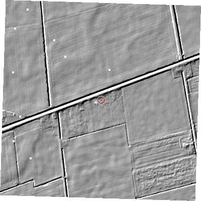 Shaded relief map of the ground around PE235BB, computed from Environment Agency LiDAR. The ground here sits at about 0 m above sea level and falls 3 m across the surrounding 800 m. Surface water reaching this point runs off ground lying to the north, 1.5 m higher.