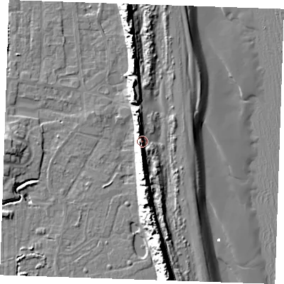 Shaded relief map of the ground around PE245BQ, computed from Environment Agency LiDAR. The ground here sits at about 9 m above sea level and falls 16 m across the surrounding 800 m. Surface water reaching this point runs off ground lying to the south, 6.3 m higher.