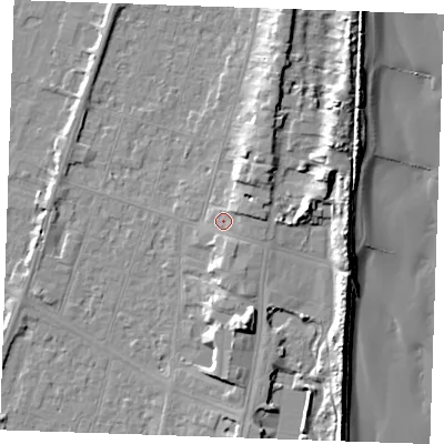 Shaded relief map of the ground around PE251BS, computed from Environment Agency LiDAR. The ground here sits at about 5 m above sea level and falls 13 m across the surrounding 800 m. Surface water reaching this point runs off ground lying to the east-north-east, 2.4 m higher.