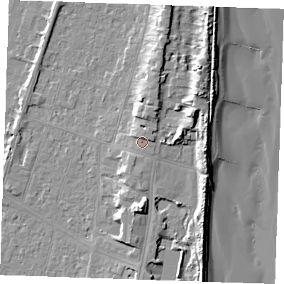Shaded relief map of the ground around PE251BX, computed from Environment Agency LiDAR. The ground here sits at about 6 m above sea level and falls 13 m across the surrounding 800 m. Surface water reaching this point runs off ground lying to the north, 1.6 m higher.