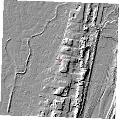 Shaded relief map of the ground around PE253BS, computed from Environment Agency LiDAR. The ground here sits at about 6 m above sea level and falls 9 m across the surrounding 800 m. Surface water reaching this point runs off ground lying to the south-east, 4.8 m higher.