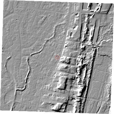 Shaded relief map of the ground around PE253EX, computed from Environment Agency LiDAR. The ground here sits at about 4 m above sea level and falls 9 m across the surrounding 800 m. Surface water reaching this point runs off ground lying to the east-south-east, 5.1 m higher.