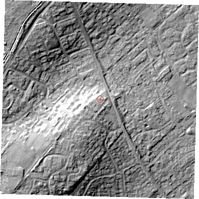 Shaded relief map of the ground around PE276TX, computed from Environment Agency LiDAR. The ground here sits at about 18 m above sea level and falls 18 m across the surrounding 800 m. Surface water reaching this point runs off ground lying to the south-west, 4.3 m higher.