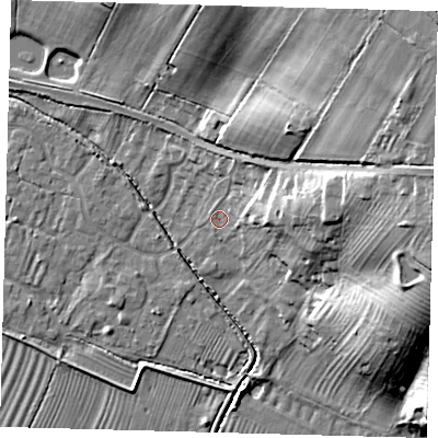 Shaded relief map of the ground around PE282BU, computed from Environment Agency LiDAR. The ground here sits at about 9 m above sea level and falls 29 m across the surrounding 800 m. Surface water reaching this point runs off ground lying to the east-north-east, 14.8 m higher.