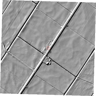 Shaded relief map of the ground around PE282UG, computed from Environment Agency LiDAR. The ground here sits at about 0 m above sea level and falls 5 m across the surrounding 800 m. Surface water reaching this point runs off ground lying to the south, 1.3 m higher.