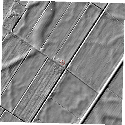 Shaded relief map of the ground around PE282UH, computed from Environment Agency LiDAR. The ground here sits at about 0 m above sea level and falls 3 m across the surrounding 800 m. Surface water reaching this point runs off ground lying to the south-west, 1.5 m higher.