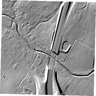 Shaded relief map of the ground around PE284DR, computed from Environment Agency LiDAR. The ground here sits at about 17 m above sea level and falls 21 m across the surrounding 800 m. Surface water reaching this point runs off ground lying to the north-north-east, 7.3 m higher.