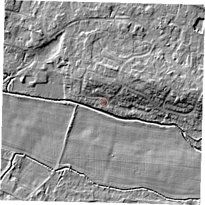 Shaded relief map of the ground around PE284TS, computed from Environment Agency LiDAR. The ground here sits at about 12 m above sea level and falls 7 m across the surrounding 800 m. Surface water reaching this point runs off ground lying to the north-north-east, 4.2 m higher.