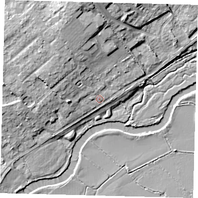 Shaded relief map of the ground around PE291XQ, computed from Environment Agency LiDAR. The ground here sits at about 11 m above sea level and falls 12 m across the surrounding 800 m. Surface water reaching this point runs off ground lying to the north-north-west, 8.4 m higher.