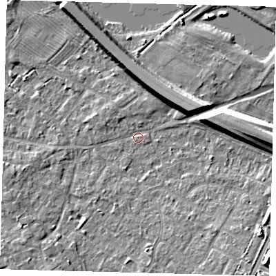 Shaded relief map of the ground around PE292DG, computed from Environment Agency LiDAR. The ground here sits at about 9 m above sea level and falls 9 m across the surrounding 800 m. Surface water reaching this point runs off ground lying to the east, 7.7 m higher.
