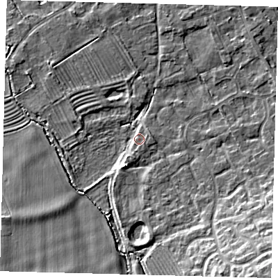 Shaded relief map of the ground around PE292LE, computed from Environment Agency LiDAR. The ground here sits at about 12 m above sea level and falls 13 m across the surrounding 800 m. Surface water reaching this point runs off ground lying to the south-east, 12.6 m higher.