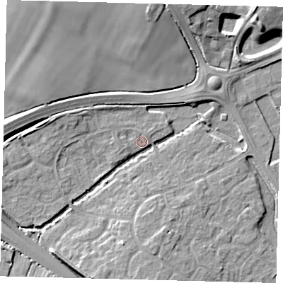 Shaded relief map of the ground around PE296UG, computed from Environment Agency LiDAR. The ground here sits at about 13 m above sea level and falls 12 m across the surrounding 800 m. Surface water reaching this point runs off ground lying to the north, 11.2 m higher.
