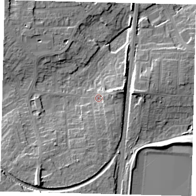 Shaded relief map of the ground around PE29EH, computed from Environment Agency LiDAR. The ground here sits at about 9 m above sea level and falls 13 m across the surrounding 800 m. Surface water reaching this point runs off ground lying to the east-north-east, 6.5 m higher.