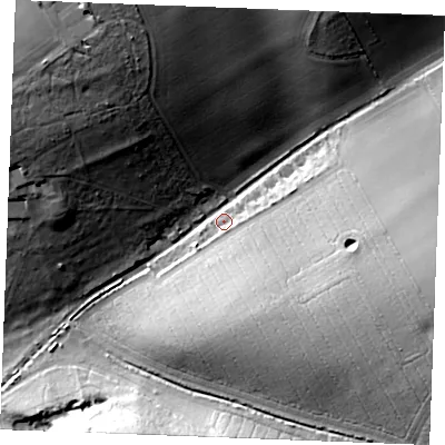 Shaded relief map of the ground around PE316SQ, computed from Environment Agency LiDAR. The ground here sits at about 33 m above sea level and falls 32 m across the surrounding 800 m. Surface water reaching this point runs off ground lying to the north-north-west, 27.9 m higher.