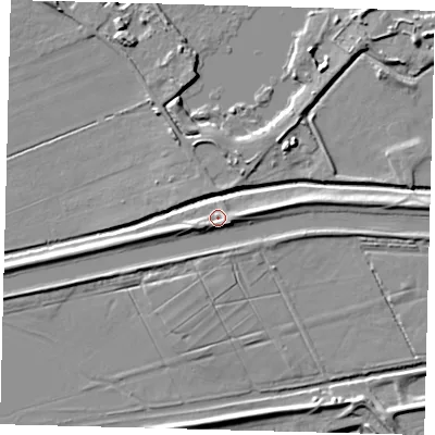 Shaded relief map of the ground around PE67YY, computed from Environment Agency LiDAR. The ground here sits at about 5 m above sea level and falls 7 m across the surrounding 800 m. Surface water reaching this point runs off ground lying to the south-east, 2.6 m higher.