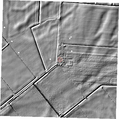 Shaded relief map of the ground around PE72NE, computed from Environment Agency LiDAR. The ground here sits at about 0 m above sea level and falls 5 m across the surrounding 800 m. The ground contributing surface water to this point lies to the north-west.