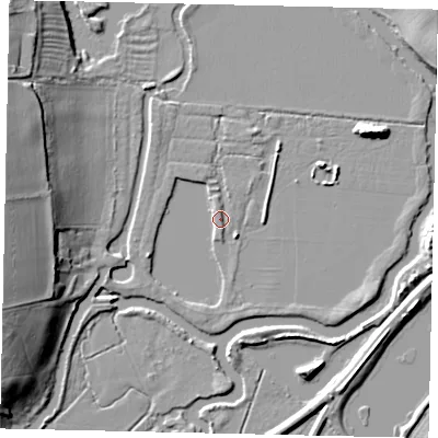 Shaded relief map of the ground around PE86PZ, computed from Environment Agency LiDAR. The ground here sits at about 12 m above sea level and falls 15 m across the surrounding 800 m. Surface water reaching this point runs off ground lying to the south-east, 2.2 m higher.