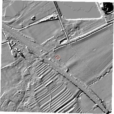 Shaded relief map of the ground around PE94RN, computed from Environment Agency LiDAR. The ground here sits at about 13 m above sea level and falls 19 m across the surrounding 800 m. Surface water reaching this point runs off ground lying to the west-south-west, 2.1 m higher.
