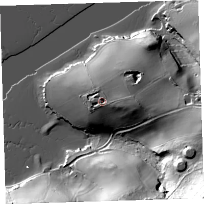 Shaded relief map of the ground around PL101JA, computed from Environment Agency LiDAR. The ground here sits at about 24 m above sea level and falls 87 m across the surrounding 800 m. Surface water reaching this point runs off ground lying to the east, 6.4 m higher.