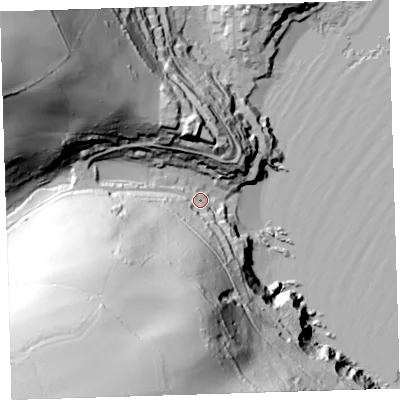 Shaded relief map of the ground around PL101PH, computed from Environment Agency LiDAR. The ground here sits at about 11 m above sea level and falls 111 m across the surrounding 800 m. Surface water reaching this point runs off ground lying to the south-south-west, 102.0 m higher.