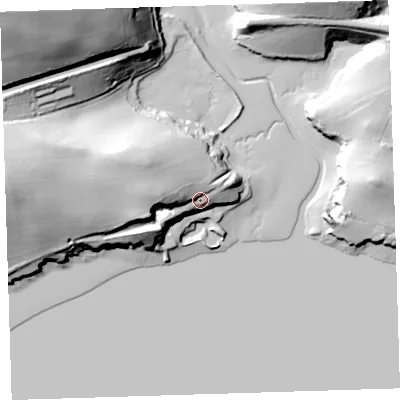 Shaded relief map of the ground around PL124QT, computed from Environment Agency LiDAR. The ground here sits at about 16 m above sea level and falls 65 m across the surrounding 800 m. Surface water reaching this point runs off ground lying to the west-north-west, 12.9 m higher.