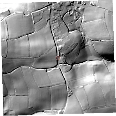 Shaded relief map of the ground around PL124RU, computed from Environment Agency LiDAR. The ground here sits at about 90 m above sea level and falls 50 m across the surrounding 800 m. Surface water reaching this point runs off ground lying to the west, 8.8 m higher.
