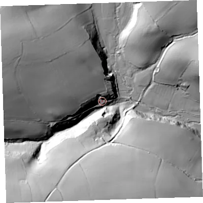 Shaded relief map of the ground around PL125JU, computed from Environment Agency LiDAR. The ground here sits at about 26 m above sea level and falls 68 m across the surrounding 800 m. Surface water reaching this point runs off ground lying to the south-west, 61.3 m higher.