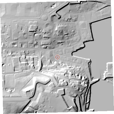 Shaded relief map of the ground around PL12JG, computed from Environment Agency LiDAR. The ground here sits at about 3 m above sea level and falls 38 m across the surrounding 800 m. Surface water reaching this point runs off ground lying to the south, 25.2 m higher.