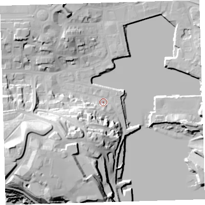 Shaded relief map of the ground around PL12LE, computed from Environment Agency LiDAR. The ground here sits at about 3 m above sea level and falls 38 m across the surrounding 800 m. Surface water reaching this point runs off ground lying to the south-south-west, 14.9 m higher.