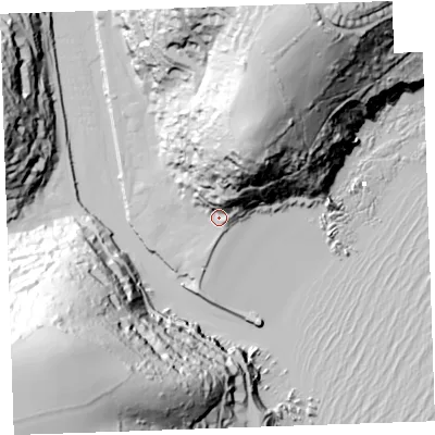Shaded relief map of the ground around PL131BU, computed from Environment Agency LiDAR. The ground here sits at about 7 m above sea level and falls 99 m across the surrounding 800 m. Surface water reaching this point runs off ground lying to the north-north-east, 26.4 m higher.