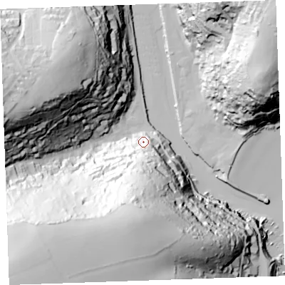 Shaded relief map of the ground around PL132DU, computed from Environment Agency LiDAR. The ground here sits at about 13 m above sea level and falls 106 m across the surrounding 800 m. Surface water reaching this point runs off ground lying to the south-south-west, 88.2 m higher.