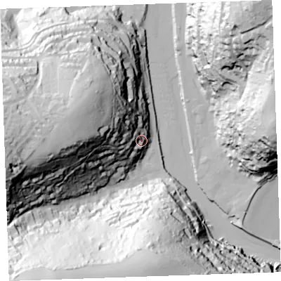 Shaded relief map of the ground around PL132EJ, computed from Environment Agency LiDAR. The ground here sits at about 18 m above sea level and falls 101 m across the surrounding 800 m. Surface water reaching this point runs off ground lying to the west, 74.1 m higher.
